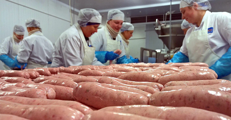 Ladies making sausages at Delenco Foods Ltd